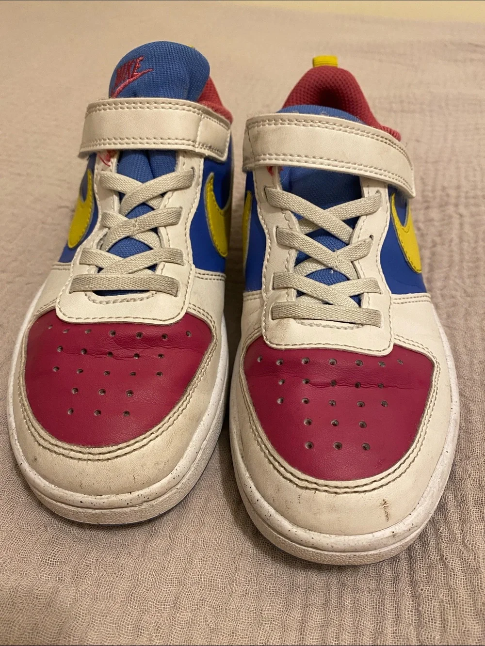 Nike Kids Low-Top Sneakers in White, Blue, Pink & Yellow. Size 13.5